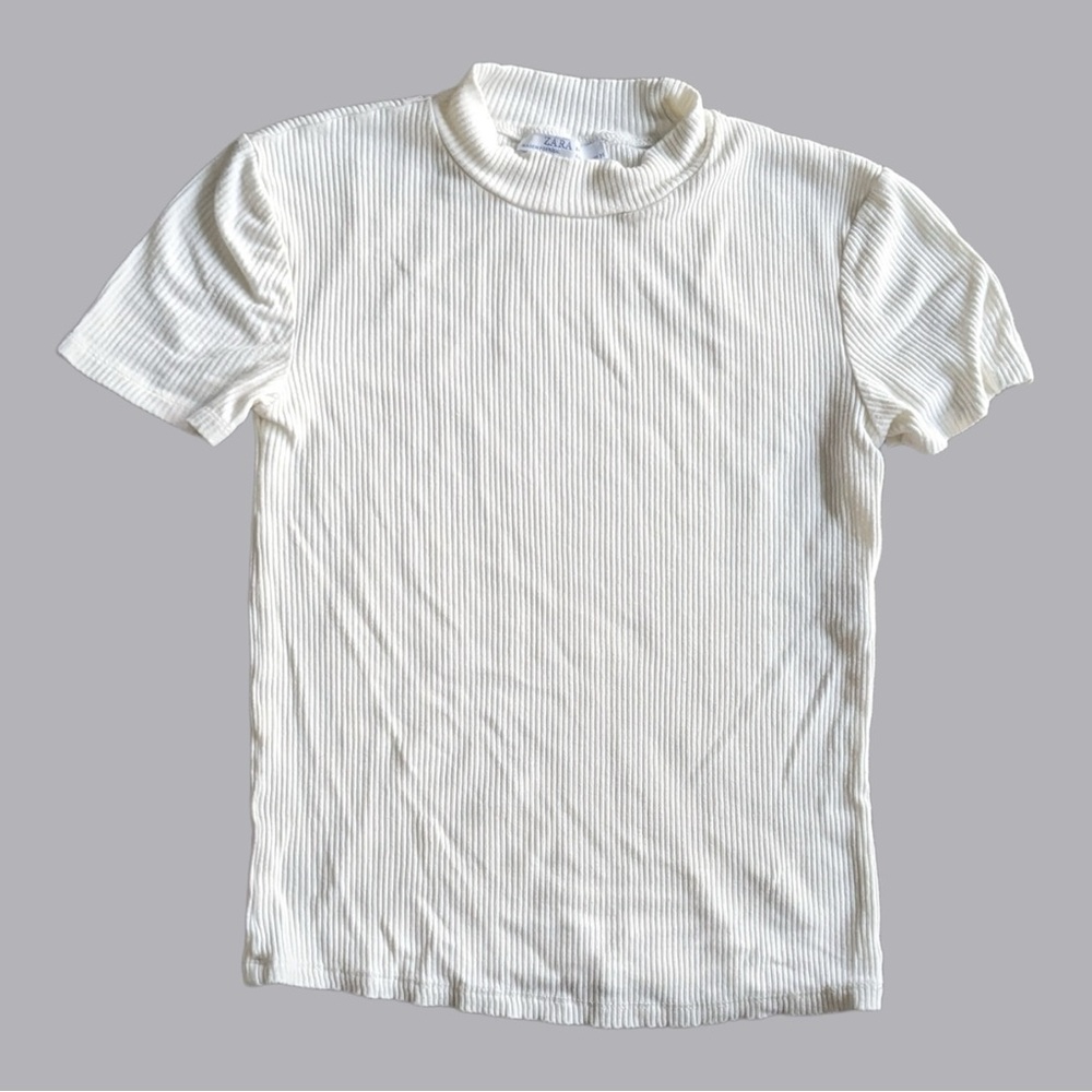 Zara’s off white ribbed mock neck